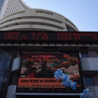 Sensex, Nifty end near record closing highs