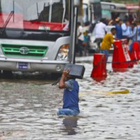 Heavy rain lashes Bangladeshi capital