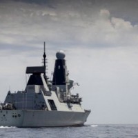 Russia summons UK envoy over warship intrusion