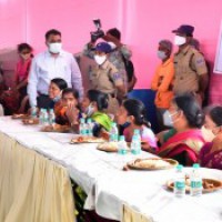 Telangana CM lunches with residents of adopted village