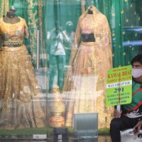 Covid, high tax burden to slowdown consumption recovery: Ind-Ra