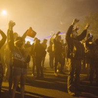 Woman dead as car rams into protesters in Minneapolis