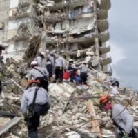 Toll from Florida building collapse reaches 11