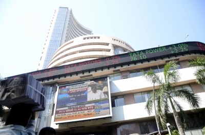 Equity indices settle marginally low amid volatile trade