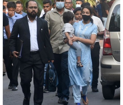 Rujira Narula with son in lap faces ED grilling for 5 hrs Rujira Narula with son in lap faces ED grilling for 5 hrs