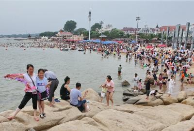 China renews alert for high temperatures