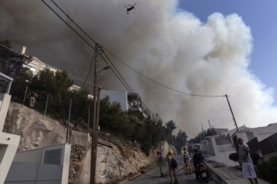 Wildfire rages in Athens, homes evacuated Wildfire rages in Athens, homes evacuated