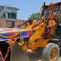 Groom rides bulldozer to bride's house in UP