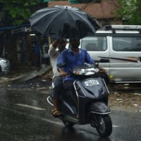 Monsoon arrives in Delhi bringing respite from sweltering heat