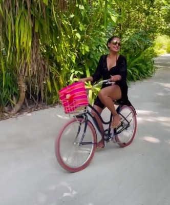 Bipasha Basu goes cycling in black bikini