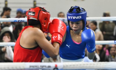 Ace boxer Mary Kom enters 51kg semis, ensures medal Ace boxer Mary Kom enters 51kg semis, ensures medal