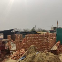 Police stops construction of houses at Singhu border