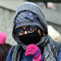 Shield yourself from Covid with three-layered masks: Experts