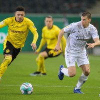 Dortmund edge Monchengladbach to book German Cup semifinals