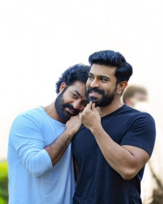 'RRR' buzz: Will Ram Charan, NTR watch the first show in disguise with fans? 'RRR' buzz: Will Ram Charan, NTR watch the first show in disguise with fans?