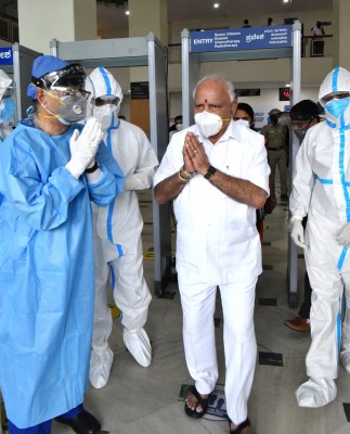 Covid patient's wife pleads for bed in front of K'taka CM's house; man dies on way to hospital Covid patient's wife pleads for bed in front of K'taka CM's house; man dies on way to hospital