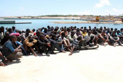 Over 2,000 migrants reach Mediterranean island by boat Over 2,000 migrants reach Mediterranean island by boat