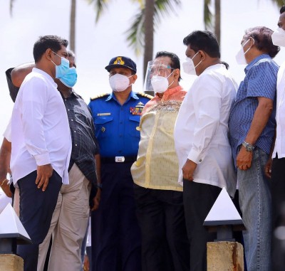 SL PM inspects coastal area affected by burning ship SL PM inspects coastal area affected by burning ship