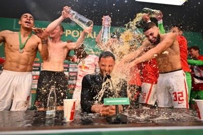 Ten-man Leipzig secure comeback win over Freiburg to lift German Cup Ten-man Leipzig secure comeback win over Freiburg to lift German Cup