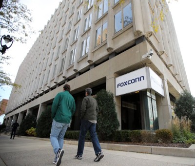 Foxconn woos fleeing workers with $70 subsidy after iPhone production hit
