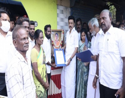 Stalin visits footballer's house, hands over Rs 10 lakh solatium, job letter for brother