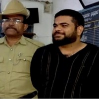 K'taka BJP leader arrested briefly over 'ready to shoot you' remark