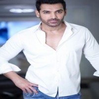 John Abraham is a 'mild and well-mannered person,' says SRK