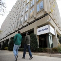 Foxconn woos fleeing workers with $70 subsidy after iPhone production hit