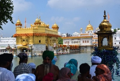 Wheelchair-bound devotee denied entry into Golden Temple Wheelchair-bound devotee denied entry into Golden Temple