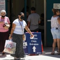 US readying for severe flu season, new Covid wave