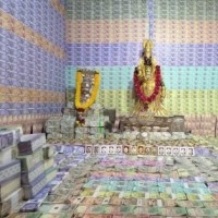 Andhra temple decorated with currency notes, gold