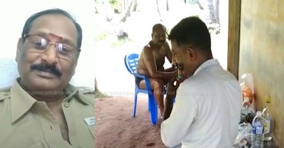 Viral video shows TN cop forced to play flute for official taking oil massage Viral video shows TN cop forced to play flute for official taking oil massage