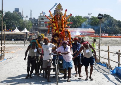 Devotees bid adieu to goddess Durga on Vijayadashami in NE Devotees bid adieu to goddess Durga on Vijayadashami in NE