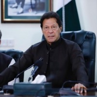 Pakistan caught in Imran and floods maelstrom