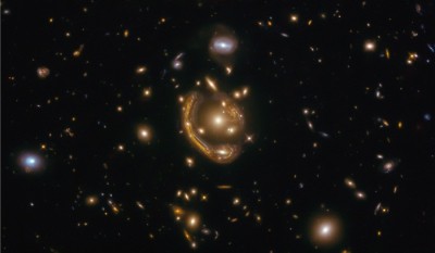 Hubble's new 'molten Einstein ring' image prompts new research Hubble's new 'molten Einstein ring' image prompts new research