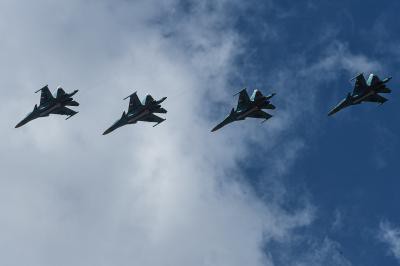 Russian fighters escort US bomber over Pacific Russian fighters escort US bomber over Pacific