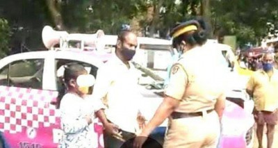 Kerala family stage protest after no action taken against erring woman cop Kerala family stage protest after no action taken against erring woman cop
