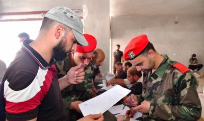 Armed rebels surrender in Syria's Daraa amid new deal Armed rebels surrender in Syria's Daraa amid new deal