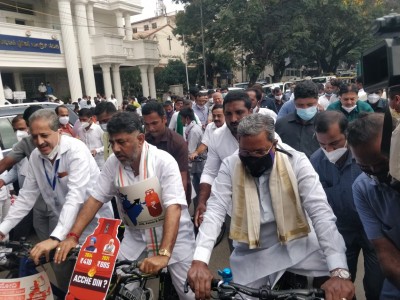 K'taka Cong leaders ride bicycles to Assembly to protest price rise K'taka Cong leaders ride bicycles to Assembly to protest price rise