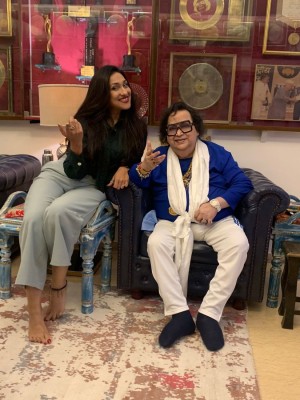 Bappi Lahiri records song with Rituparna Sengupta for Durga Puja Bappi Lahiri records song with Rituparna Sengupta for Durga Puja