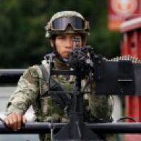Mexico launches raids after assassination attempt on police chief