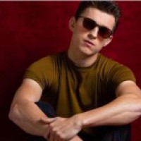 Tom Holland flaunts his abs in mirror selfie