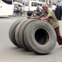 Vehicle runs over 2 men changing tyre of truck