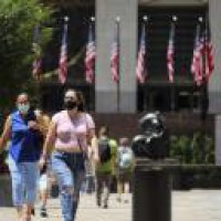 US woman arrested after smashing face mask display