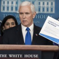 Pence stays campaigning despite aide's Covid-19 diagnosis