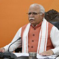 Haryana CM greets people, does yoga in home