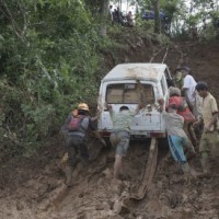 10 workers trapped as landslides hit Indonesian coal mine
