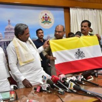 State Flag of Karnataka unveiled, seeks Centre's approval