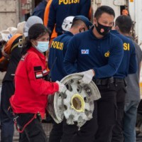 Search intensifies for crashed Indonesian plane's black boxes