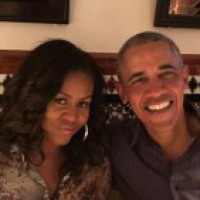 On 28th wedding anniversary, Obamas urge people to vote